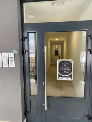 a sign on the door of a building at New Apartment in the City in Visoko