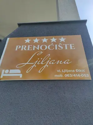 a sign on the side of a building at Prenoćište Ljiljana 2 in Livno