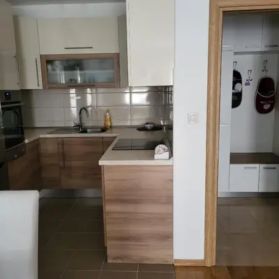 a kitchen with a sink and a counter top at Apartman Pati in Livno