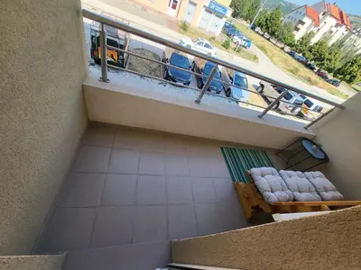 an overhead view of a balcony with a table and chairs at Apartman Pati in Livno