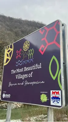 a sign that says the most beautiful villages of derbyshire and happiness at Villa Pampas in Banja Luka