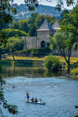a group of people in a boat on a river at Villa Pampas in Banja Luka