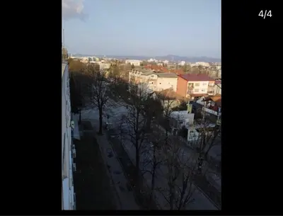 a view of a city with buildings and a bridge at Babici 3 in Hiseti