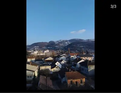 a view of a city with houses and mountains at Babici 3 in Hiseti