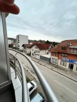 a view of a city street from a bus at Apartman Lana in Doboj
