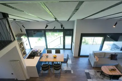 a living room with a couch and a table at Modern House in Visoko in Visoko