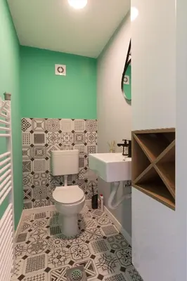 a bathroom with a toilet and a sink at Modern House in Visoko in Visoko