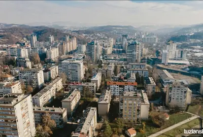 an aerial view of a city with tall buildings at A First class za 4 osobe 2 spavaće sobe in Tuzla