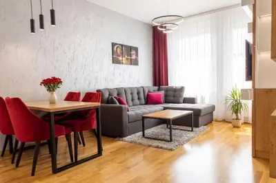a living room with a couch and a table at Drobac apartman in Banja Luka