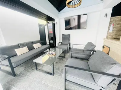 a living room with a couch and chairs at Apartman Kiss in Jajce