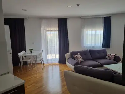 a living room with a couch and a table at Kašmir in Bugojno
