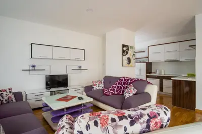a living room with a couch and a table at Kašmir in Bugojno