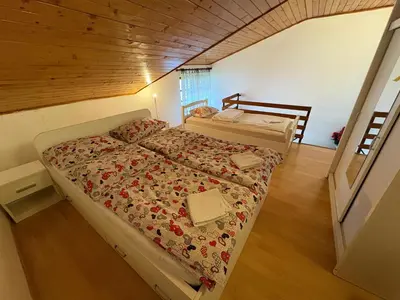 a bedroom with a bed in a room at Stan Centar in Banja Luka