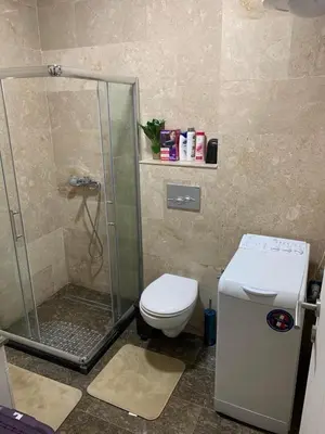 a bathroom with a shower and a toilet at Apartment Pahuljica in Travnik