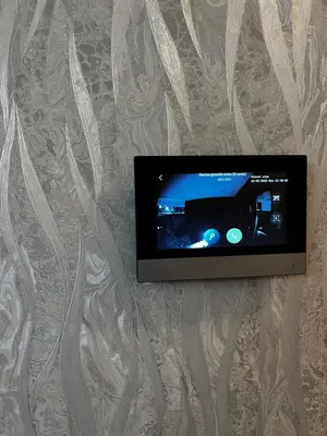 a flat screen tv hanging on a wall at Emma Park Lake in Tuzla
