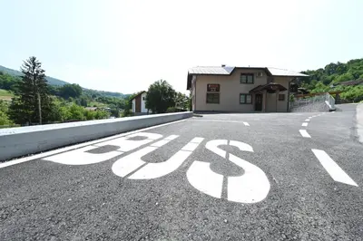 a road with a bike lane painted on it at Sobe - Rooms Drvorez in Banja Luka