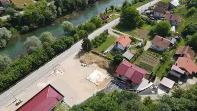an aerial view of a house next to a river at Sobe - Rooms Drvorez in Banja Luka