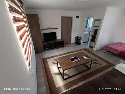 an aerial view of a living room with a coffee table at Apartmani Kula in Tuzla