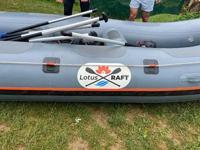 a raft with a bunch of paddles in it at Holiday home LOTUS in Bihać
