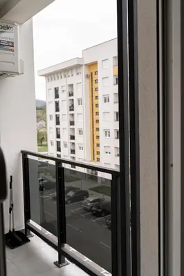 a balcony with a view of a building at Apartman SLOL in Banja Luka