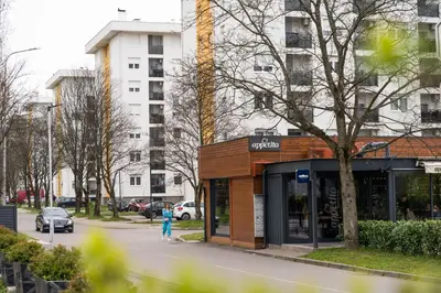 a building on the side of a street at Apartman SLOL in Banja Luka