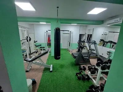 a room with a gym with a punching bag in it at Apartman Vany in Tuzla