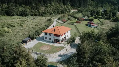 an aerial view of a house with a red roof at Apartments MoonRiver in Bihać