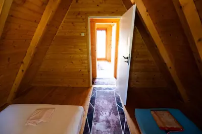 a room with a bed in a attic at Peace of mind in Visoko