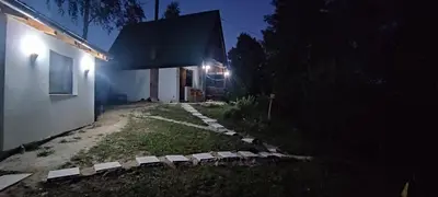 a house at night with a pathway in front of it at Positive energy in Visoko