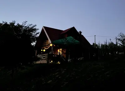 a house at night with the lights on at Brvnaria in Slatina Varoš