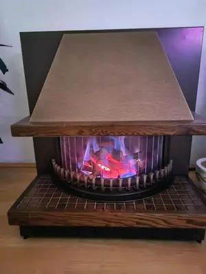 a fire oven in a kitchen with a counter top at Apartment Mirror in Visoko