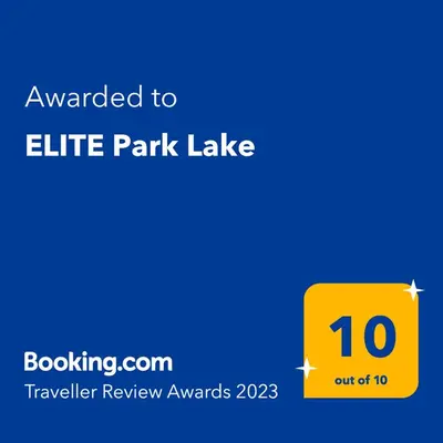 a yellow sign that reads awarded to little park lake at ELITE Park Lake in Tuzla