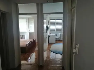 a view of a living room from the hallway at HomeB&E in Tuzla