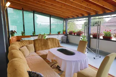 a living room with a couch and a table at Apartman Bucko in Bihać
