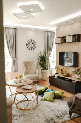 a living room with a couch and a table at Fontana apartmani 1 FREE parking in Tuzla