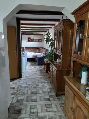a room with a living room with a unintention Ch Ubestosbestosbestos Group at Home of nature - kuća prirode in Odžak
