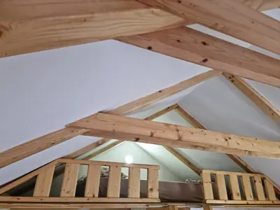 a ceiling in a room with wooden beams at Holiday Home SAJRA in Kulen Vakuf
