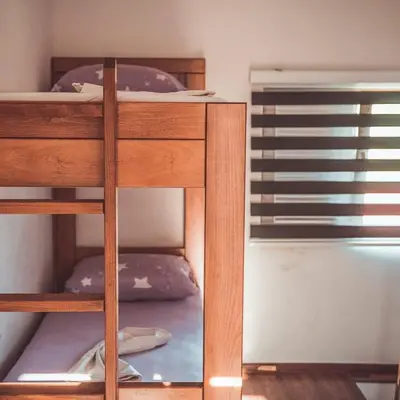 a bunk bed room with two bunk beds in it at 