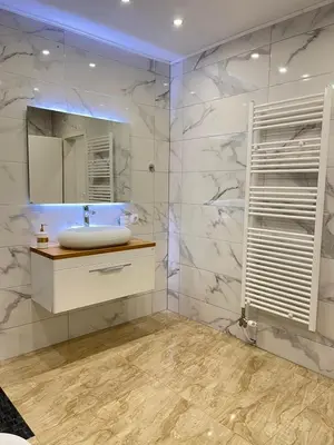 a bathroom with a sink and a mirror at Una Bihac 4 in Bihać
