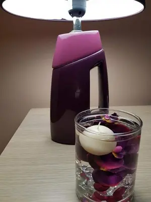 a tea pot and a glass cup with candy at Apartman Radjenovic in Banja Luka
