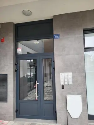 a blue door of a building with at Apartman Paradiso in Banja Luka
