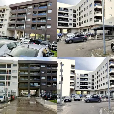 four pictures of a parking lot in front of a building at Apartman kod Brke 20 A Bulevar Vojvode Živojina Mišiča in Banja Luka