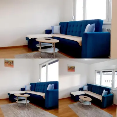 a living room with a blue couch and a table at Apartman kod Brke 20 A Bulevar Vojvode Živojina Mišiča in Banja Luka