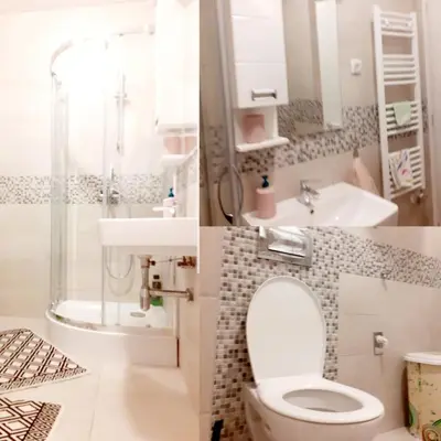a bathroom with a toilet and a sink and a shower at Apartman kod Brke 20 A Bulevar Vojvode Živojina Mišiča in Banja Luka