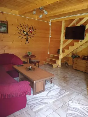 a living room with a couch and a table at Apartmani Kajkut in Banja Luka