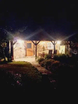 a house at night with lights in the yard at Magaze de Luxe in Gradačac