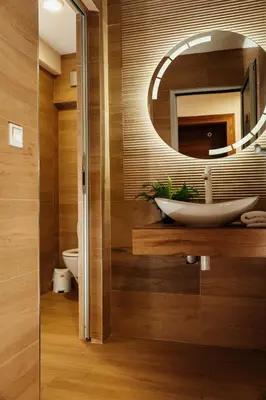 a bathroom with a sink and a mirror at Edemus - Motel & Restaurant in Maglaj