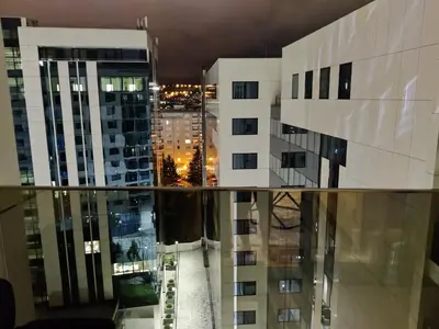 a view of a city at night from a building at Yellow Submarine apartment Banja Luka in Banja Luka