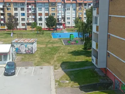an aerial view of a park with a playground at Apartman Vesna in Doboj