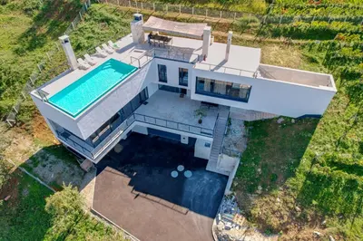 an overhead view of a house with a swimming pool at Villa Wineyard - VinoGrad in Banja Luka